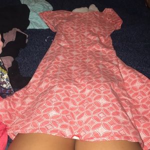 Orange dress with crazy back.